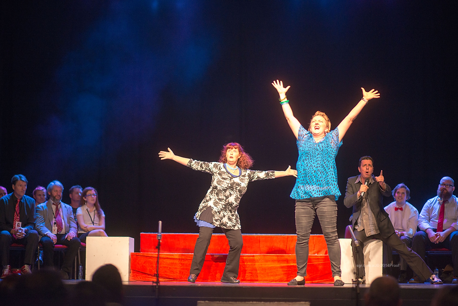 Impro Melbourne players Jenny Lovell, Sarah Kinsella and Rik Browk strut their stuff on the stage at The Enmore